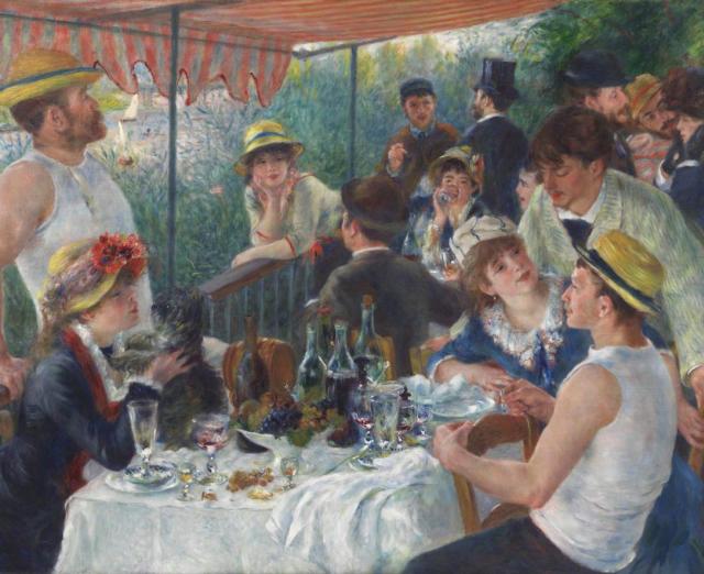 outdoor gathering of people around table drinking wine and mingling under orange awning